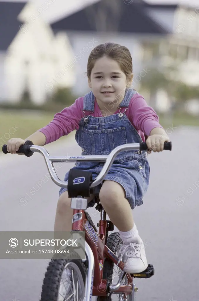 Portrait of a girl riding a bicycle