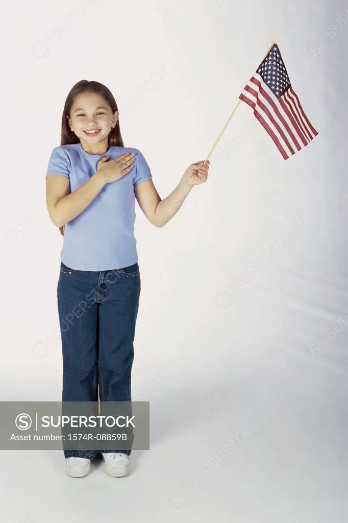 Portrait of a girl holding an American flag