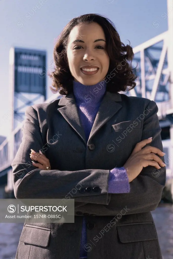 Portrait of a young businesswoman with her arms folded