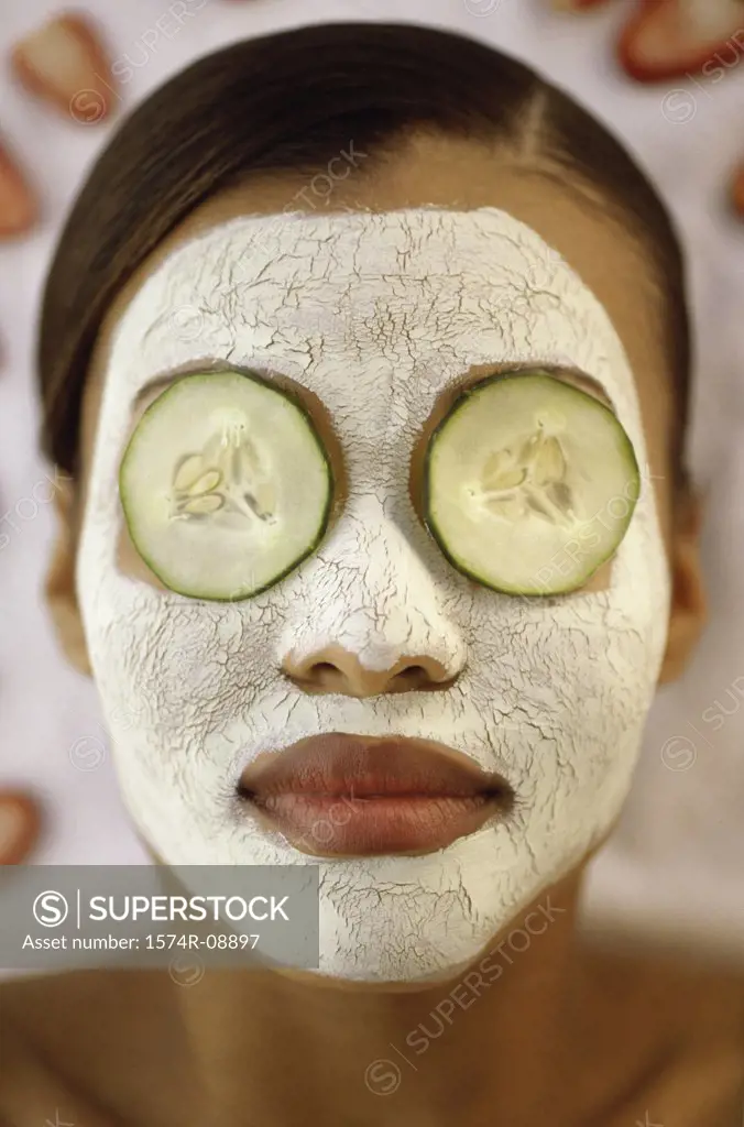 Close-up of a young woman wearing a facial mask