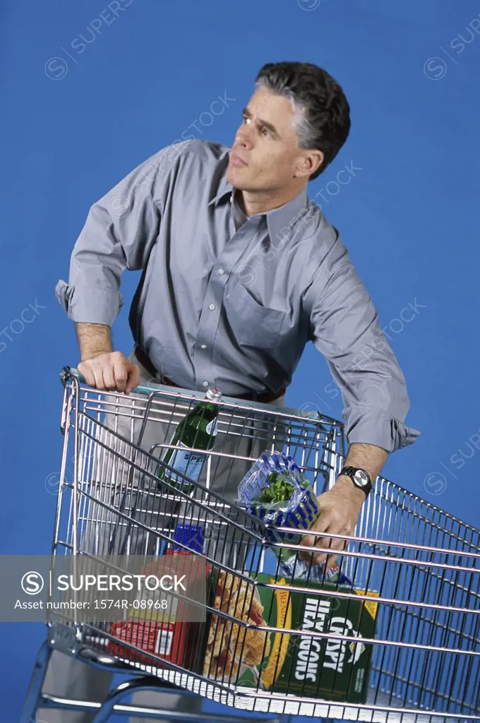 Man shopping with a shopping cart