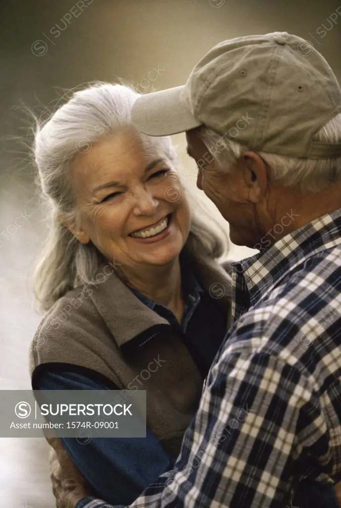 Senior man hugging a senior woman