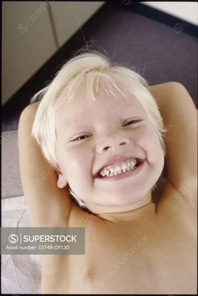 High angle view of a boy laughing