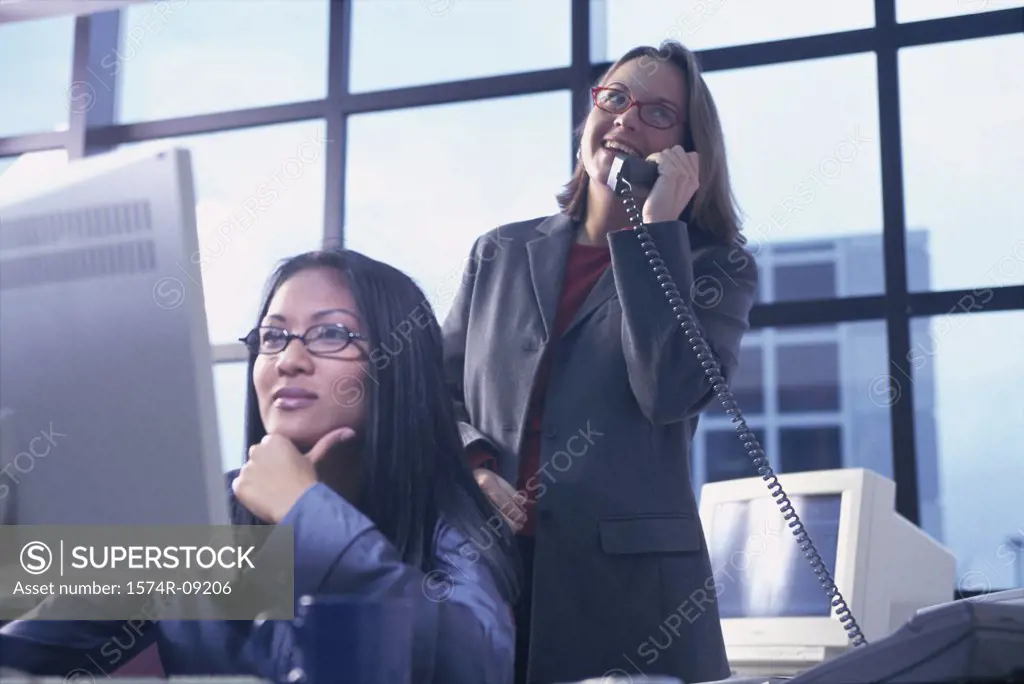 Two businesswomen working in an office