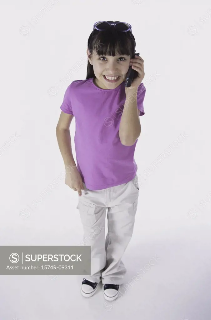 Portrait of a girl talking on a mobile phone
