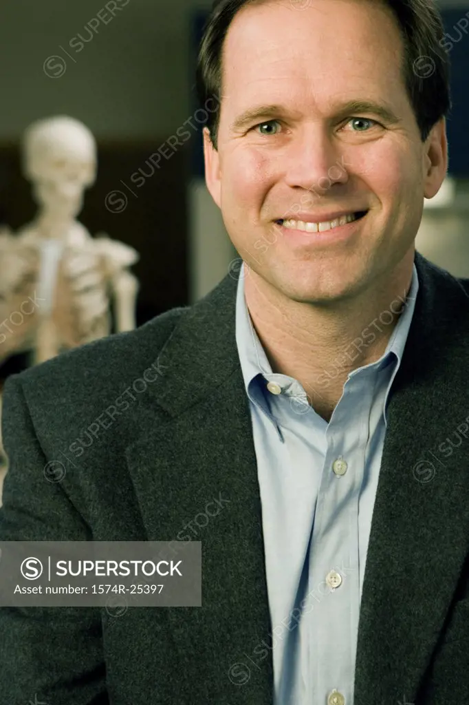 Portrait of a male teacher smiling