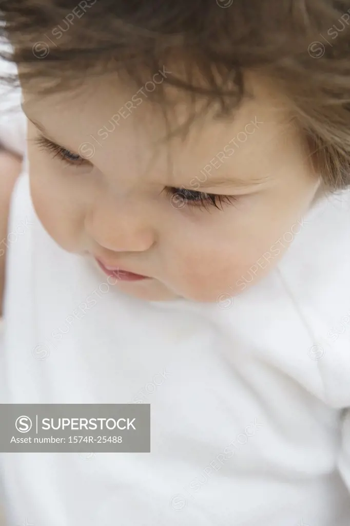 Close-up of a baby looking down