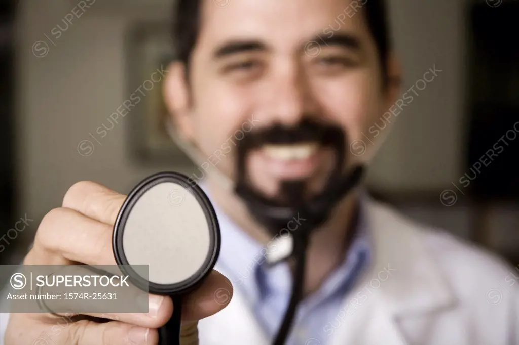 Portrait of a doctor holding a stethoscope and smiling