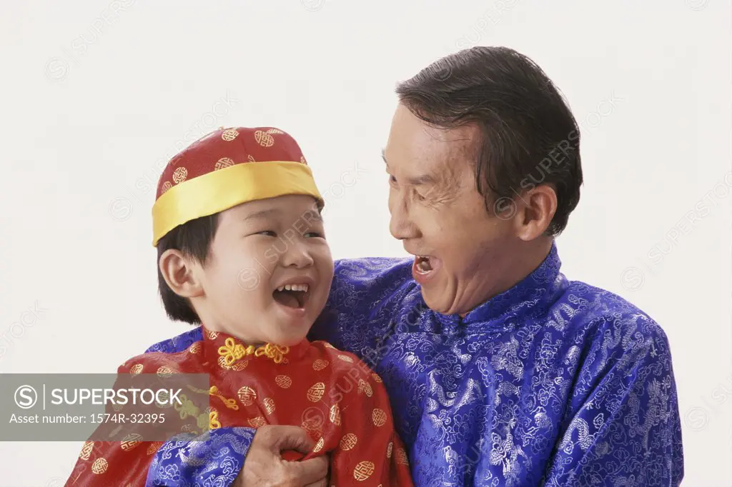 Father and his son in traditional clothing