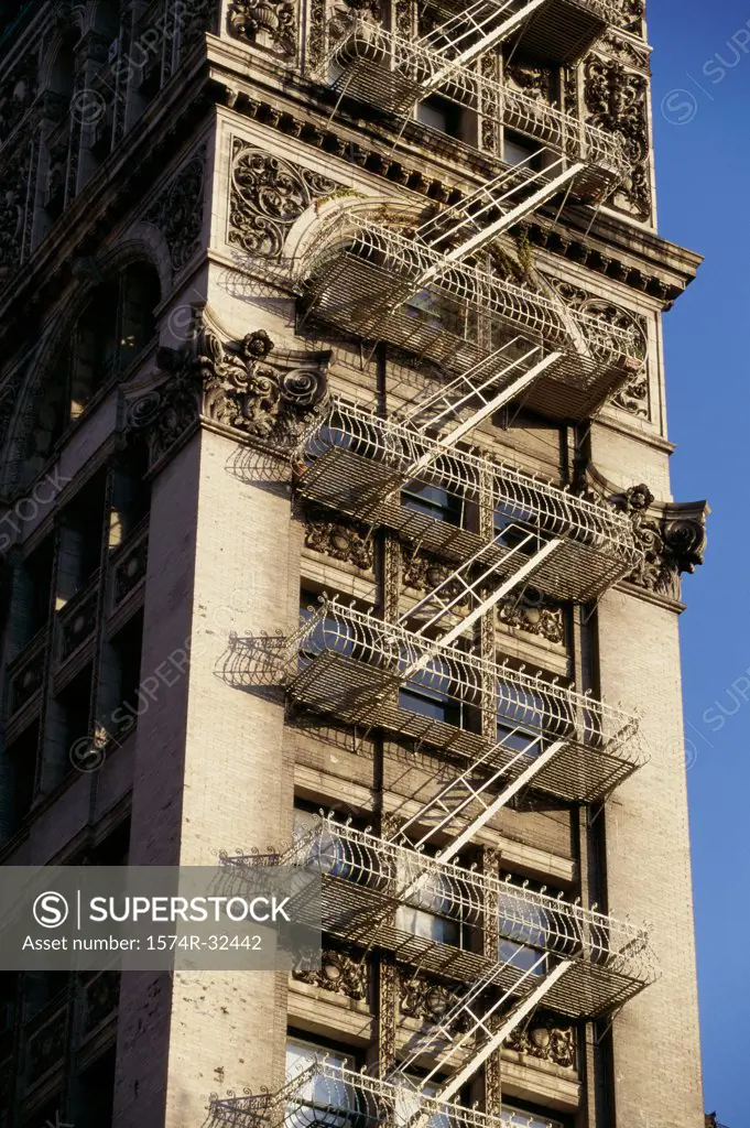 Low angle view of fire escapes on a building, New York City, New York, USA