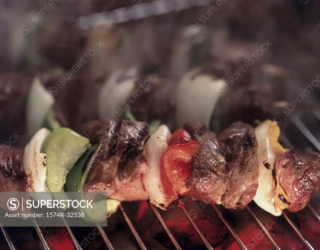 Close-up of shish kebabs on a barbecue grill
