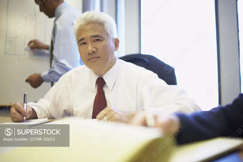 Portrait of a businessman in a conference room