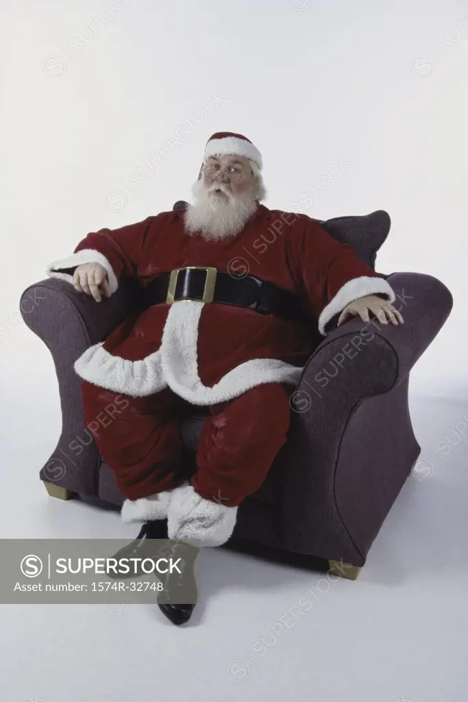 Portrait of Santa Claus sitting in an armchair