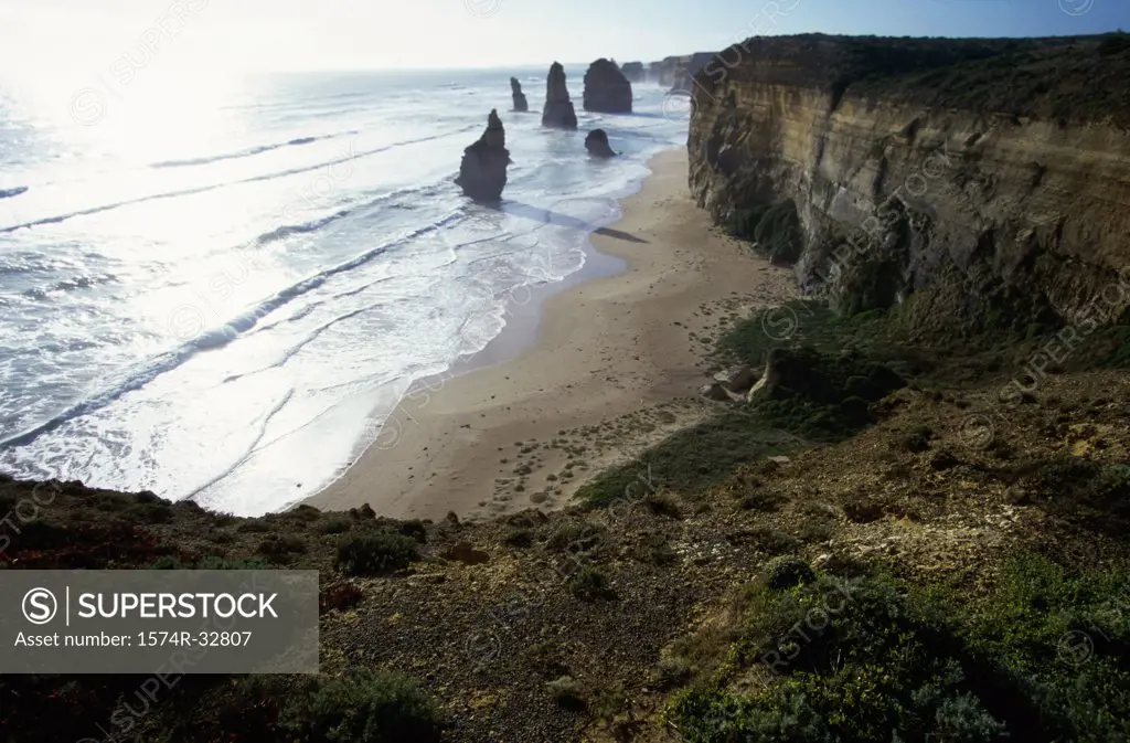 High angle view of rock formations on the beach, Twelve Apostles, Port Campbell National Park, Victoria, Australia