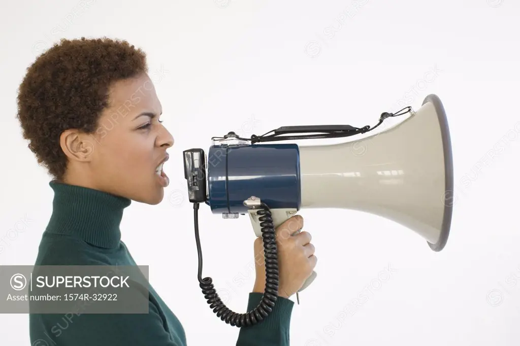 Businesswoman shouting into a megaphone