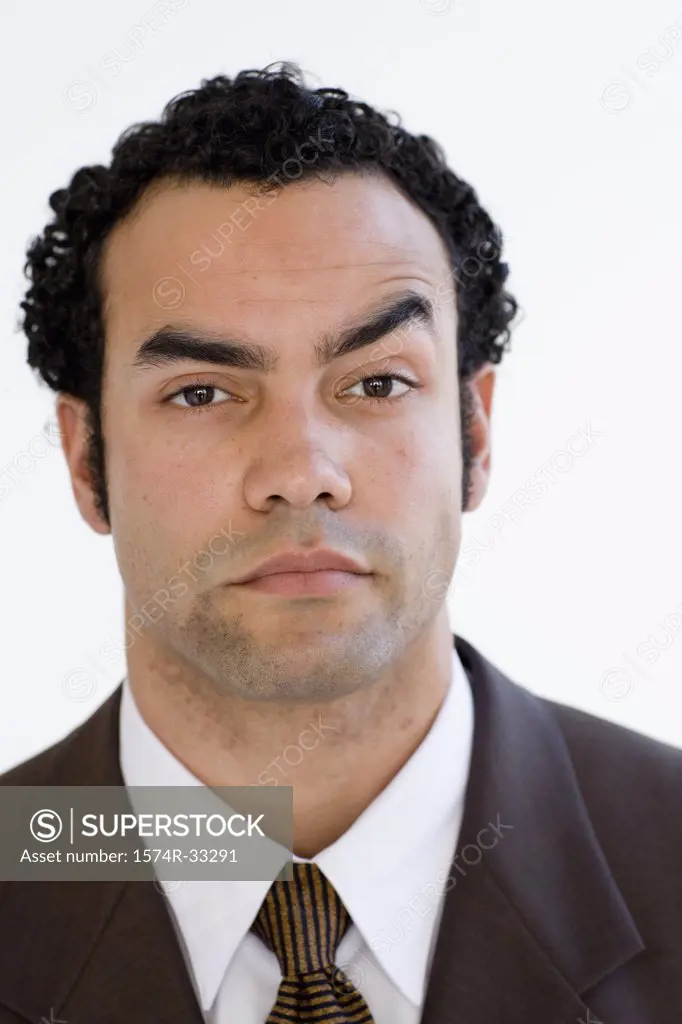 Portrait of a businessman making a face