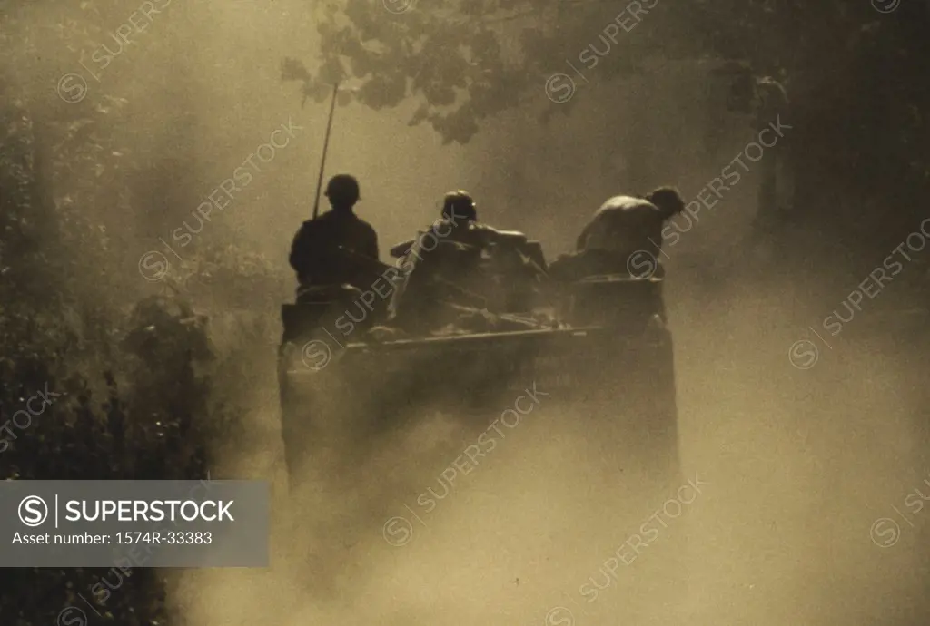 Army soldiers on a military land vehicle, Cambodia