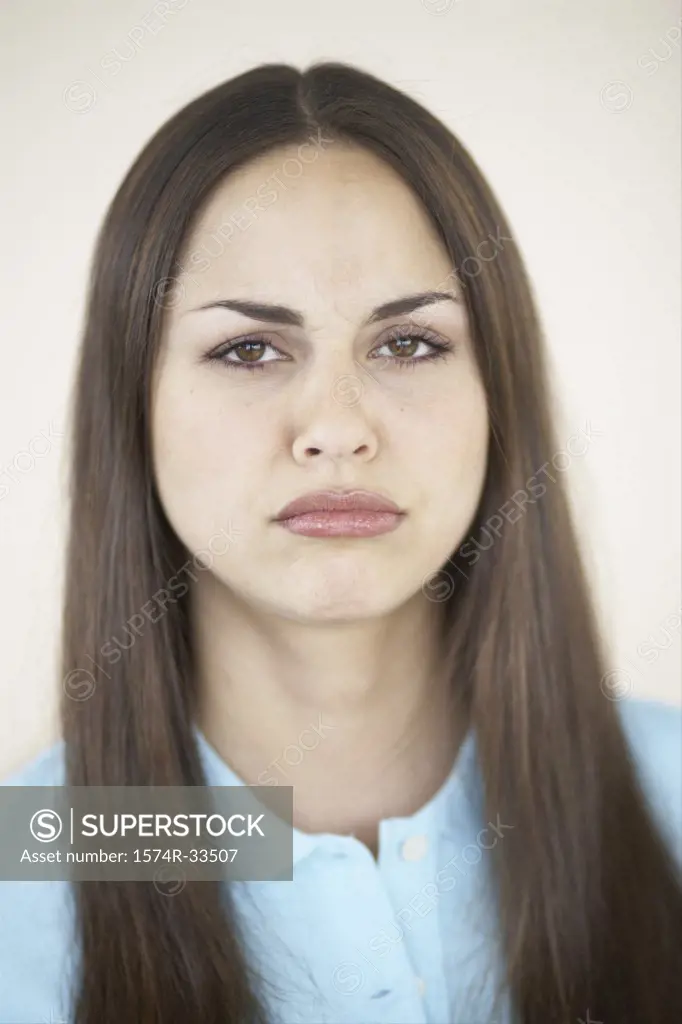 Portrait of a young woman pouting