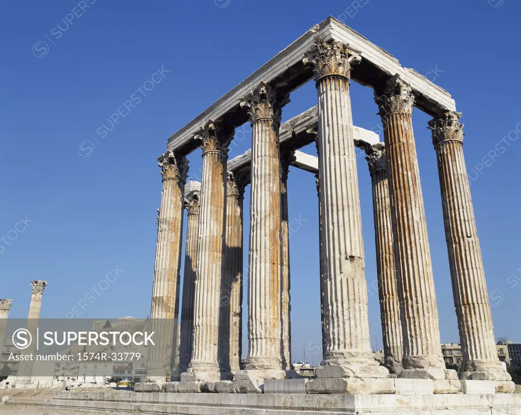 Low angle view of the old ruins of a temple, Temple of Olympian Zeus, Athens, Greece