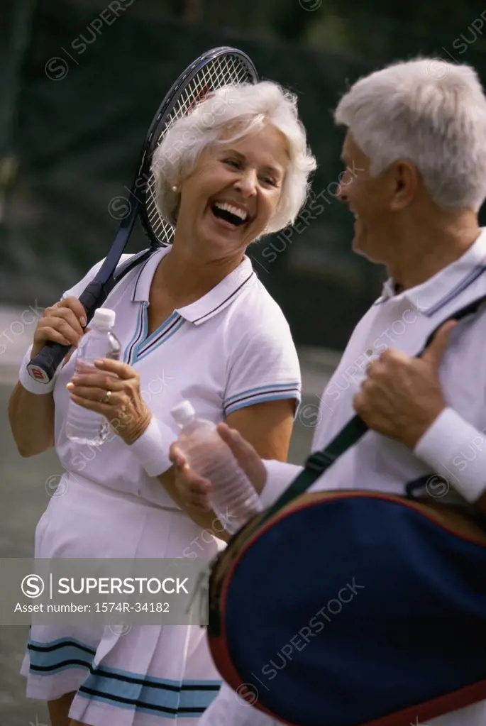 Senior couple walking together and smiling