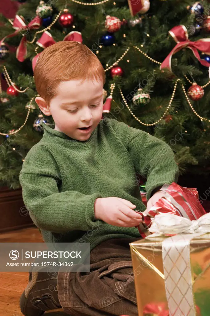 Boy opening a Christmas present