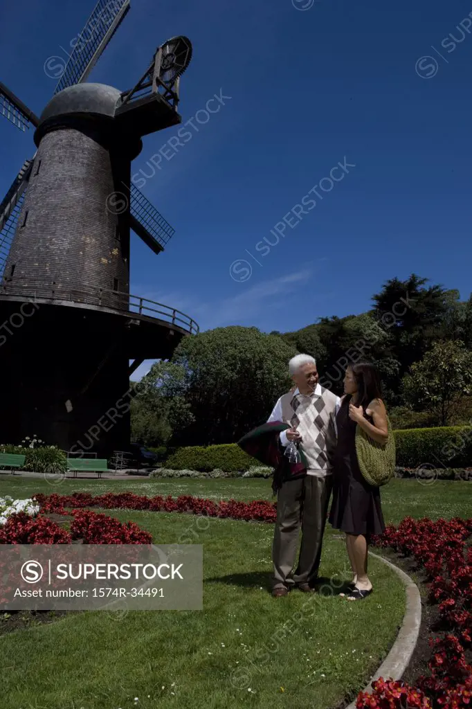 Mature couple walking in a park, Golden Gate Park, San Francisco, California, USA