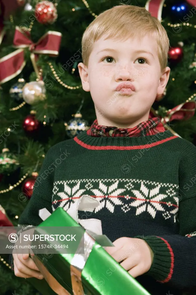 Boy opening a Christmas present