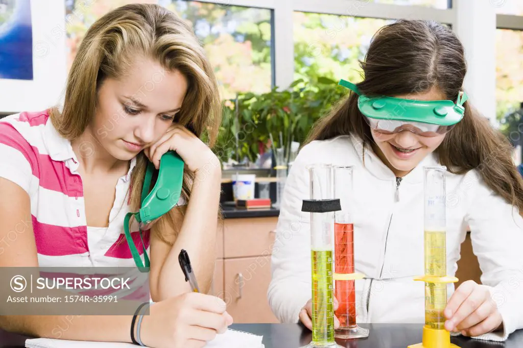 Student doing a scientific experiment in a laboratory