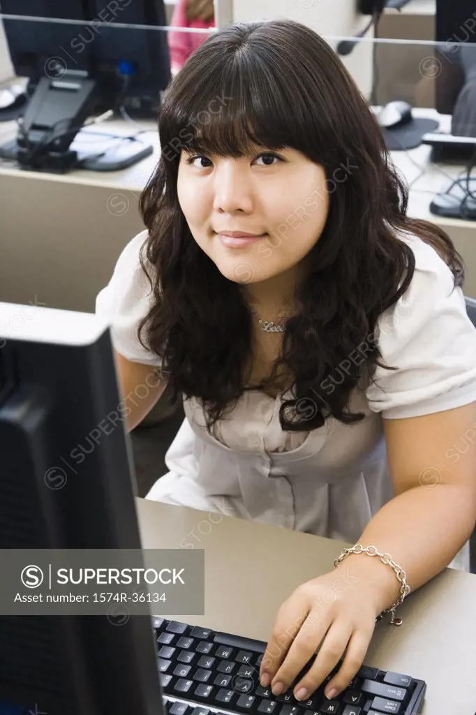 Student sitting in a computer room