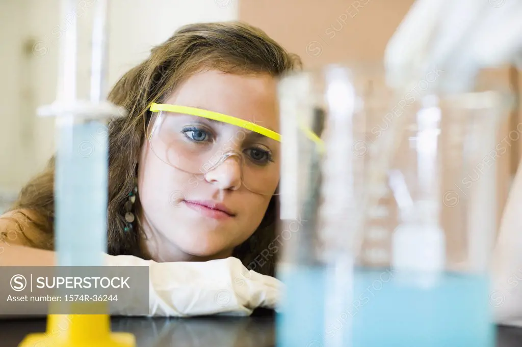 Student doing a scientific experiment in a laboratory