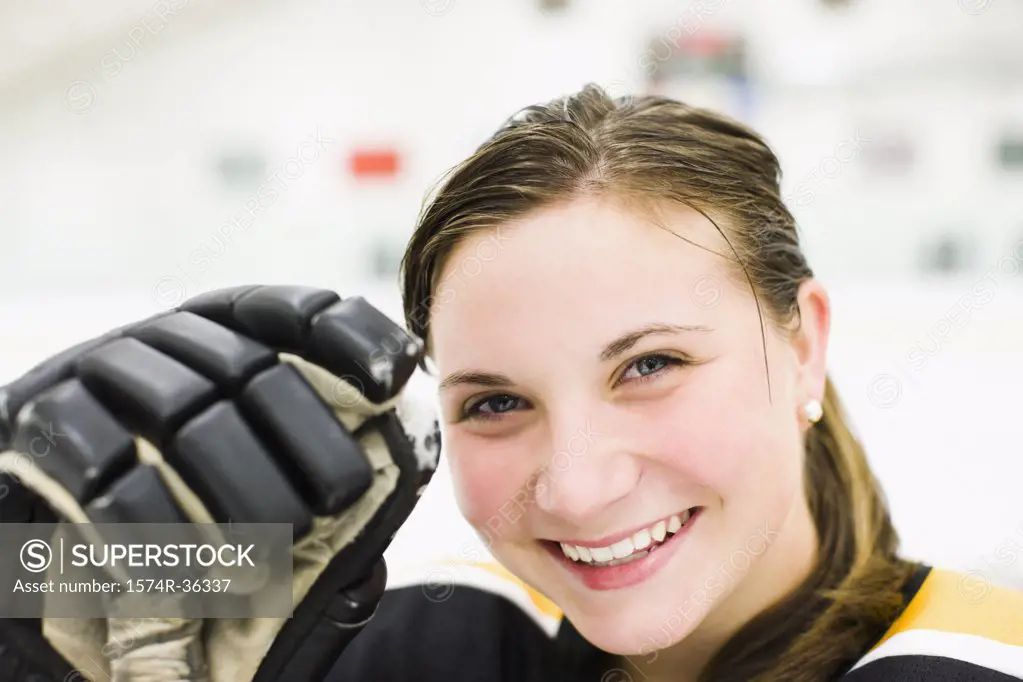 Portrait of an ice hockey player smiling