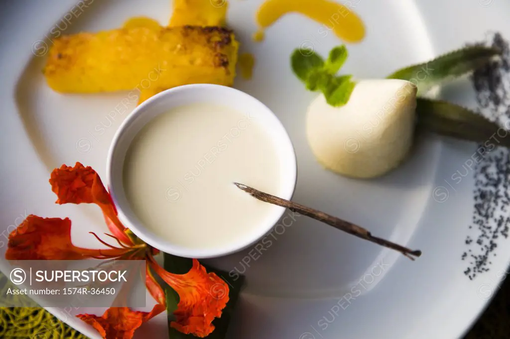 Vanilla custard with a Hibiscus flower in a plate, Papeete, Tahiti, French Polynesia