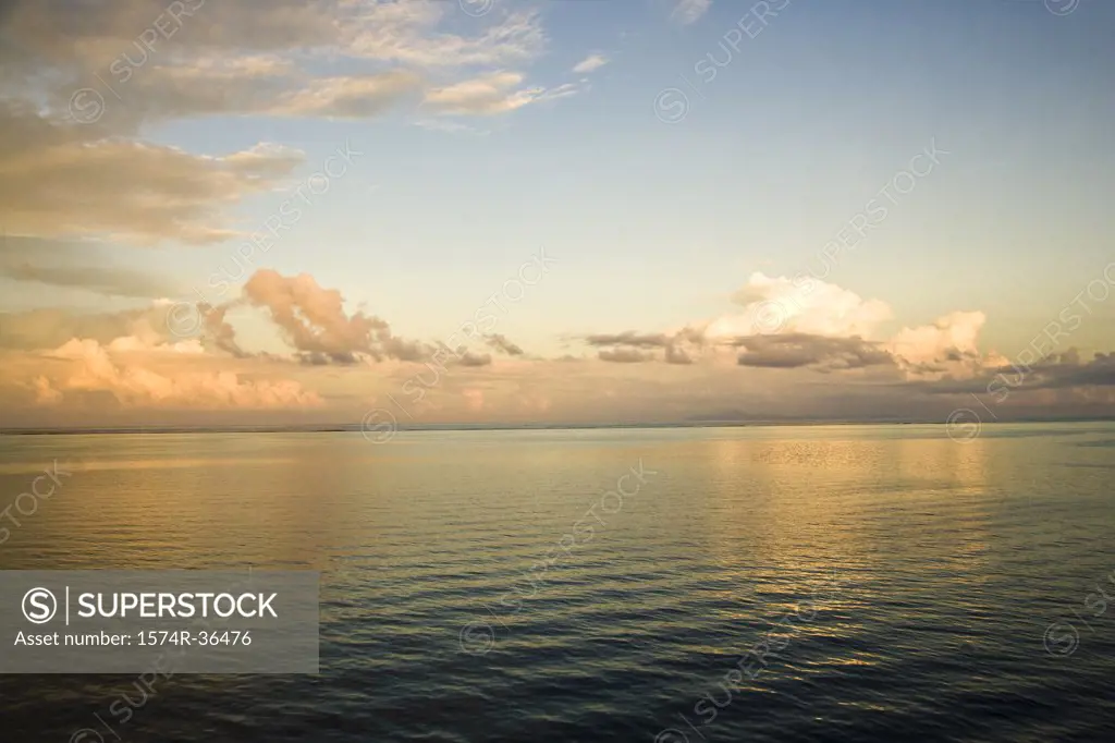 Clouds over the sea at dusk, Raiatea Island, Tahiti, French Polynesia