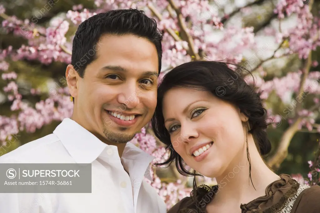 Portrait of a couple smiling in a park