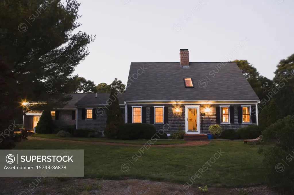 House lit up at dusk, Cape Cod, Massachusetts, USA