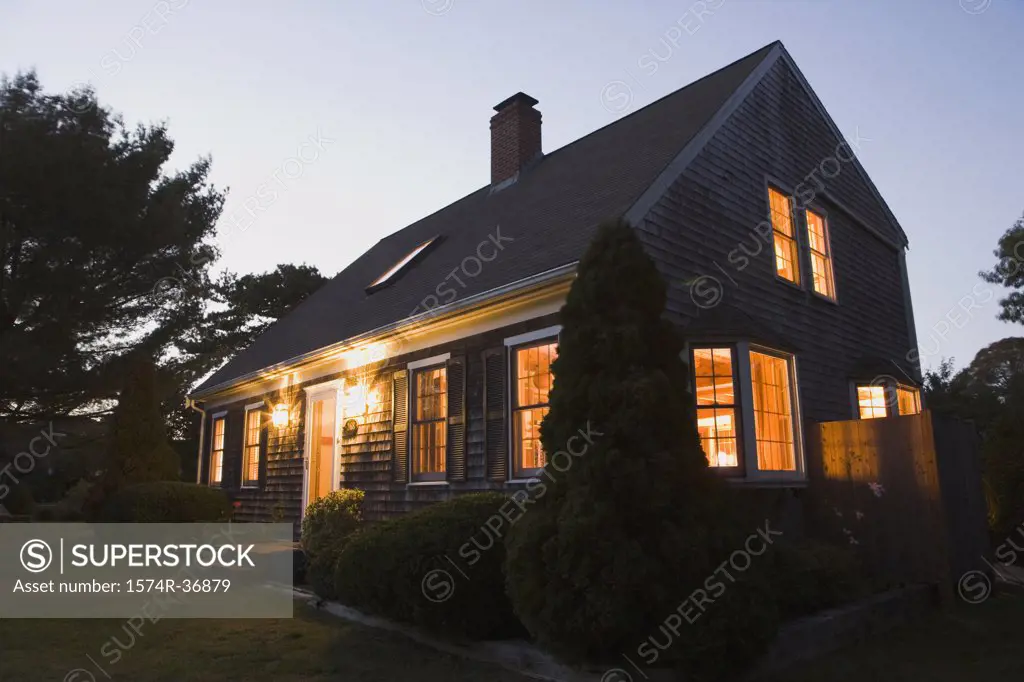 House lit up at dusk, Cape Cod, Massachusetts, USA