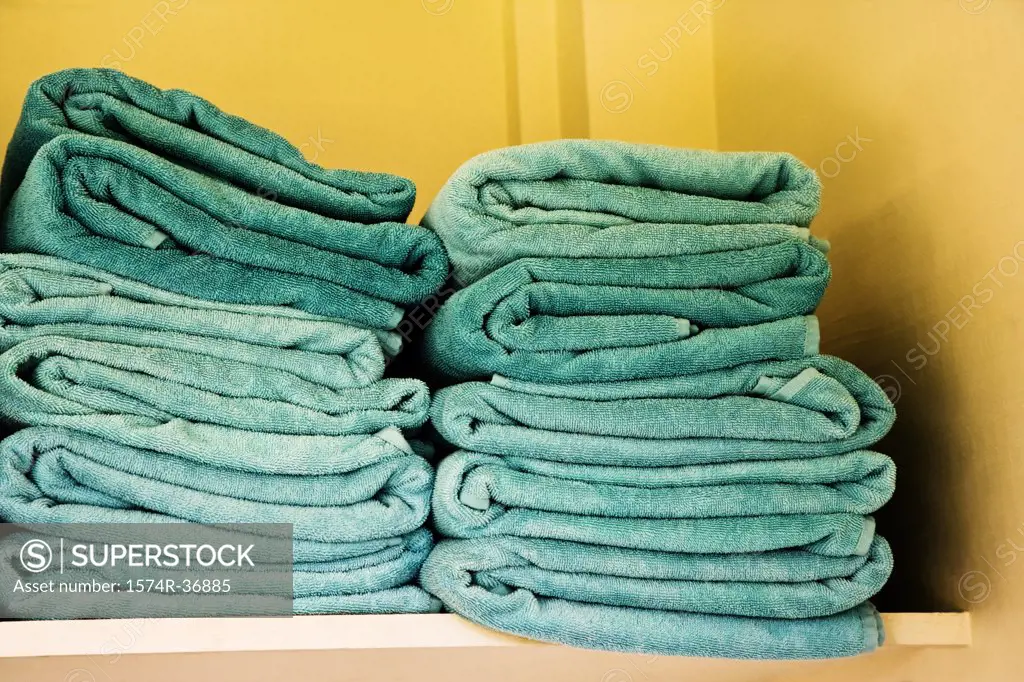 Stack of towels on a rack