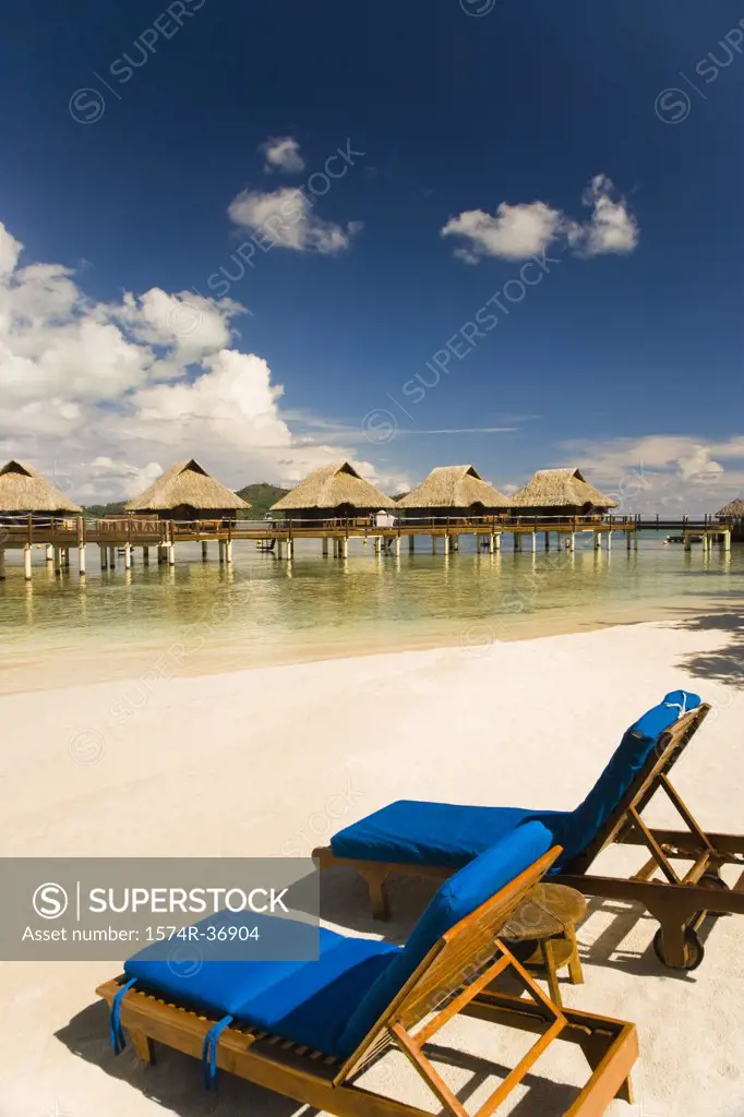 Lounge chairs on the beach, Bora Bora, Tahiti, French Polynesia
