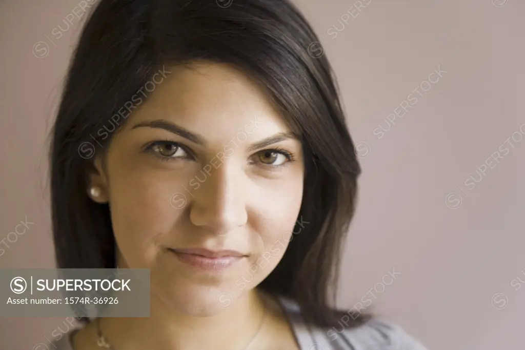 Portrait of a woman smirking