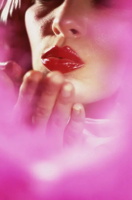 Close-up of a woman blowing kisses