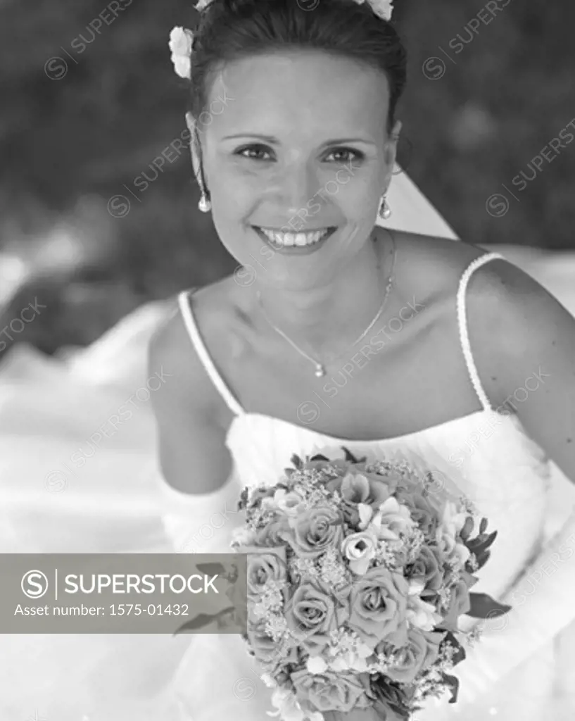Portrait of Bride holding bouquet