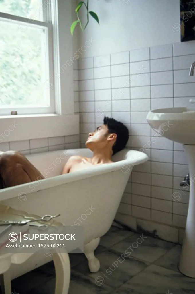 Man in bathtub