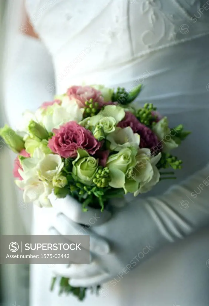 Close up of wedding bouquet held by bride