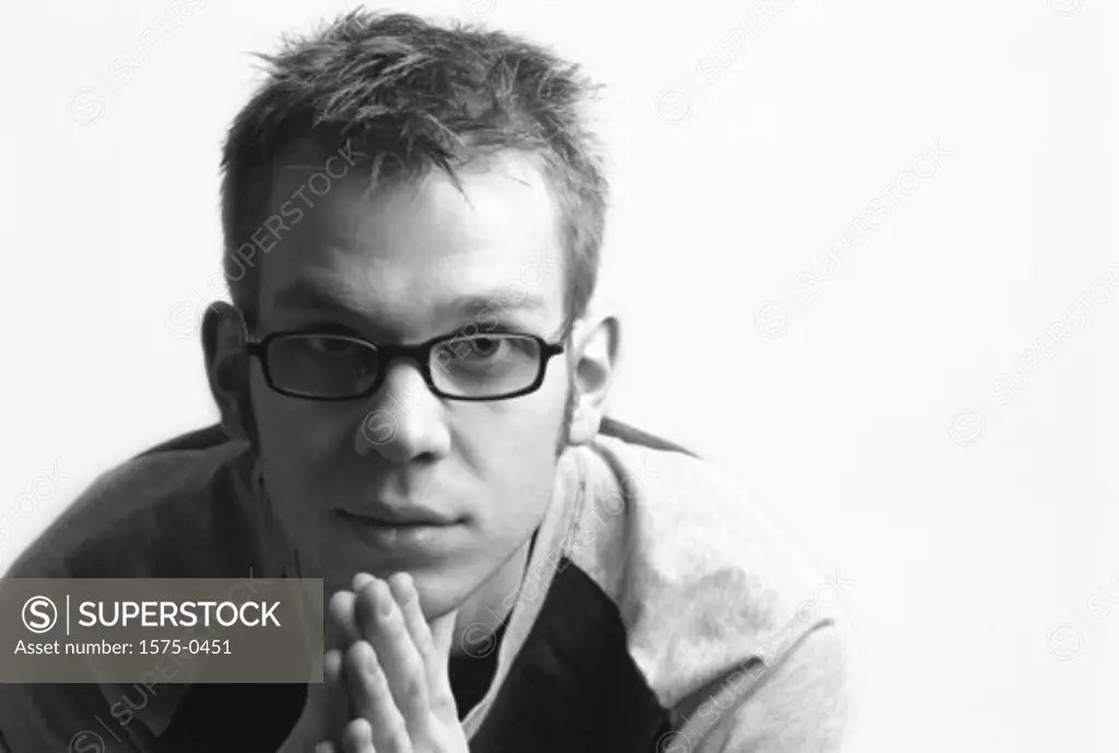 Portrait of young man with glasses