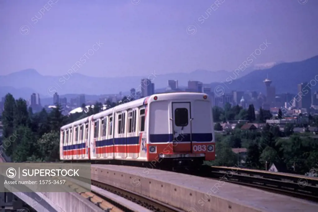 Skytrain with downtown in background, Vancouver, British Columbia, Canada