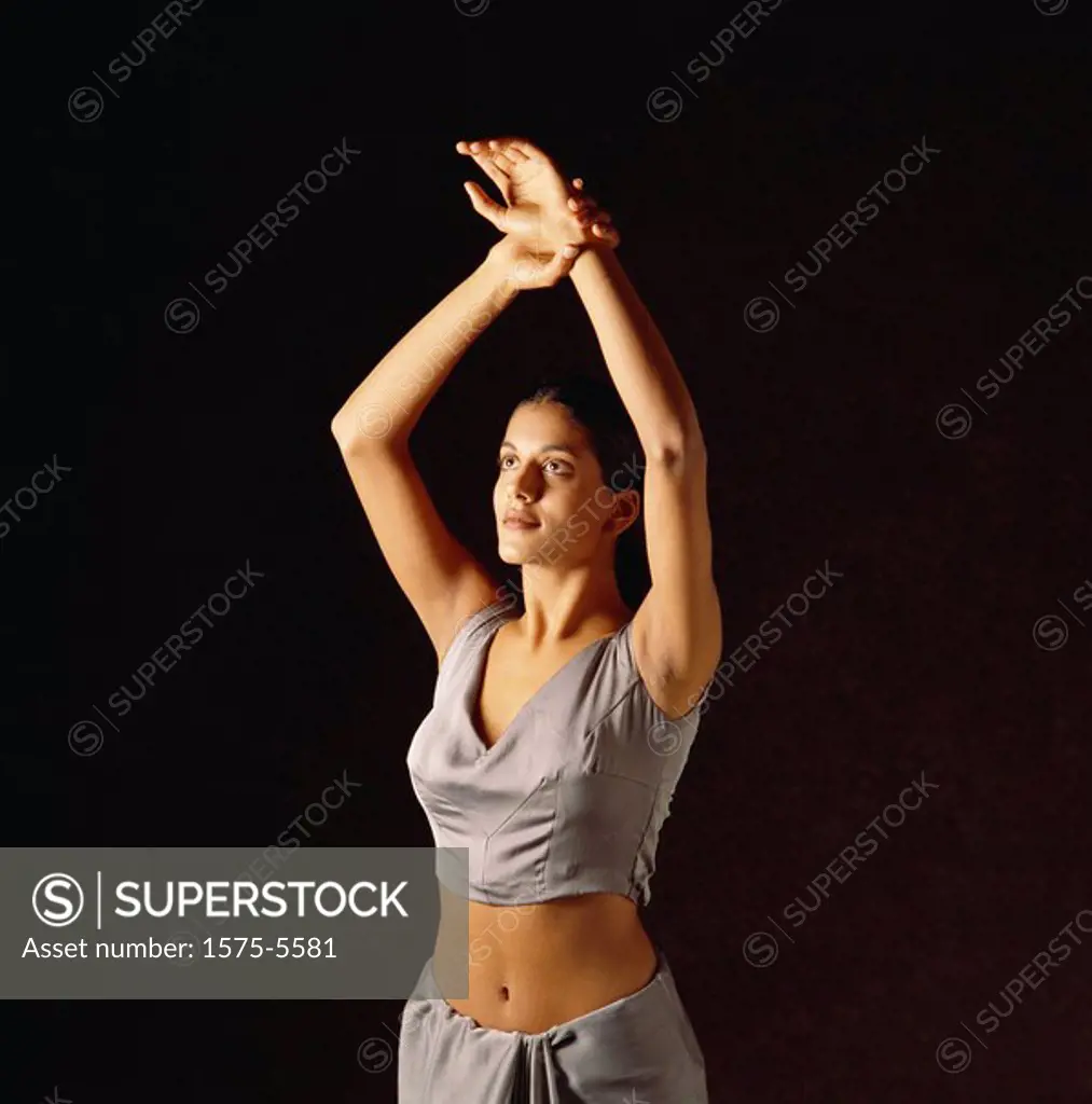 Woman in athletic clothing stretching