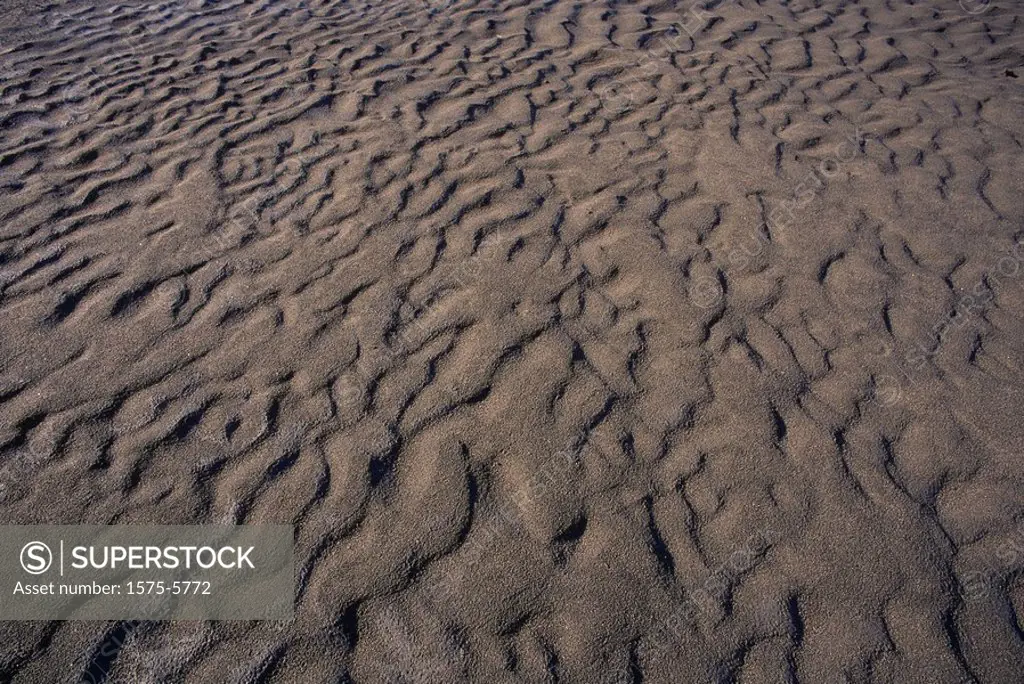 Sand patterns in river bed, Nahani National Park, NWT, Canada