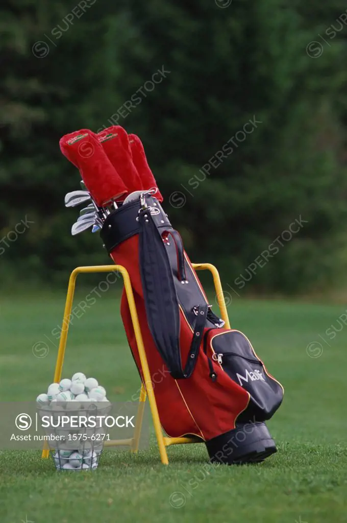 Golf bag with Golf clubs and balls.