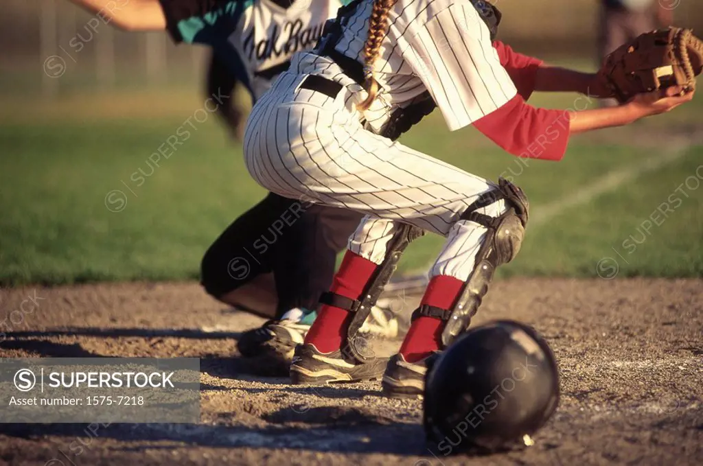 softball, sliding into home base