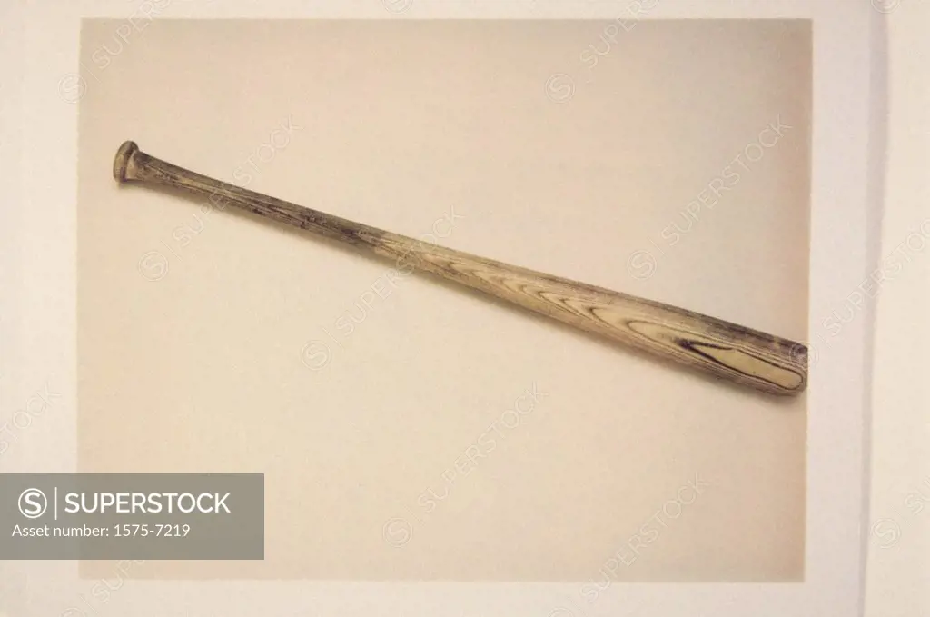 antique baseball bat on white background